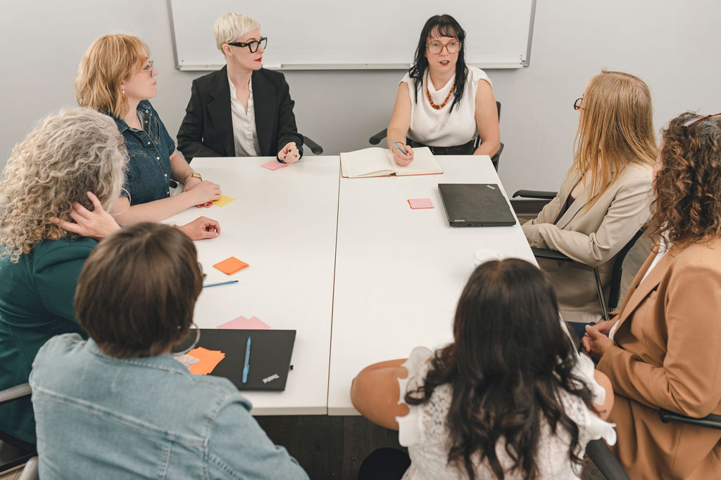 Untapped team meet a a boardroom table
